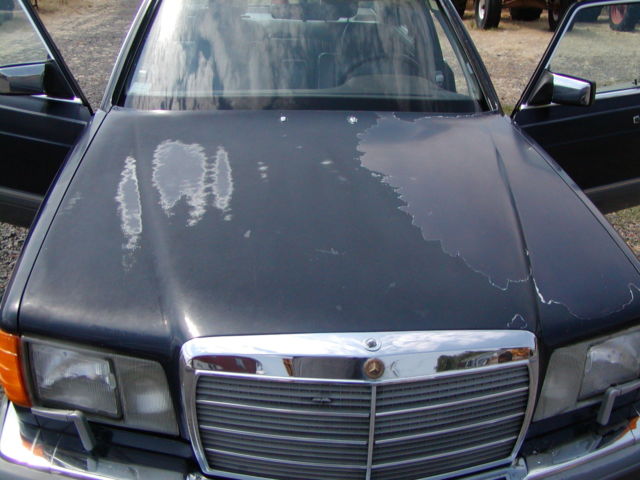 1986 Blue Mercedes-Benz 400-Series Sedan