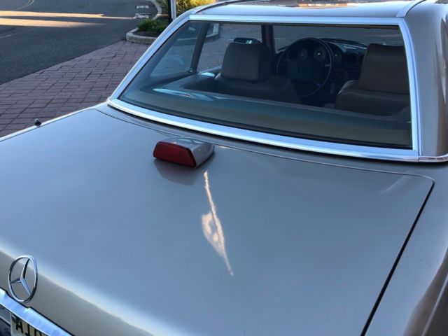 1986 Gold Mercedes-Benz SL-Class Convertible