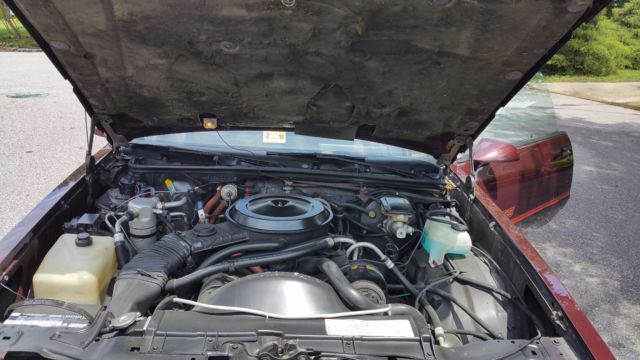 1986 Burgundy Chevrolet Monte Carlo Coupe