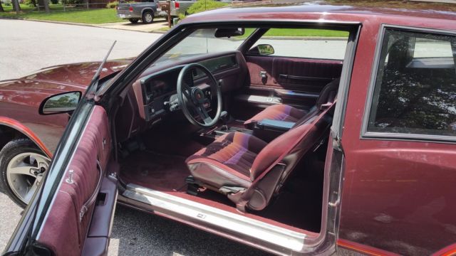 1986 Burgundy Chevrolet Monte Carlo Coupe