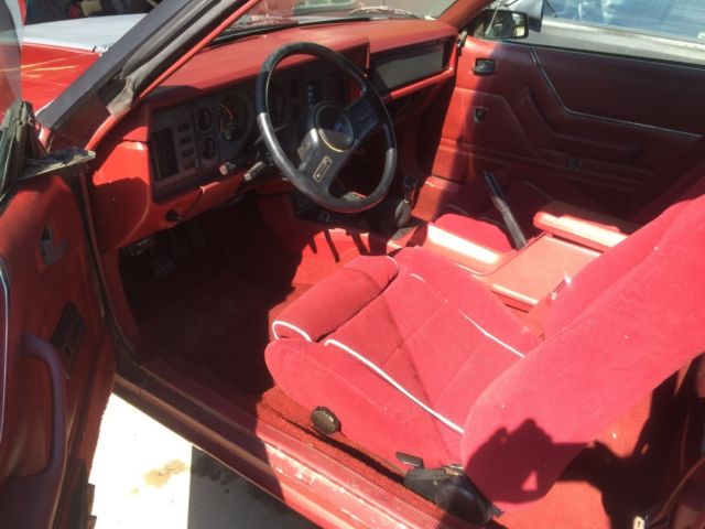 1986 Canyon red Ford Mustang