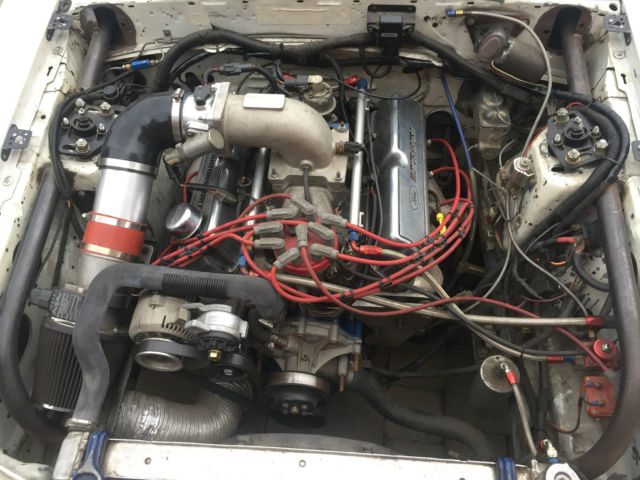 1986 White Ford Mustang Hatchback