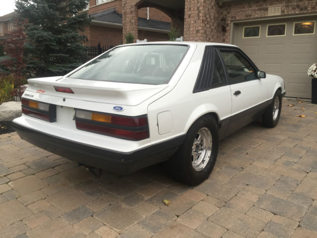 1986 White Ford Mustang Hatchback