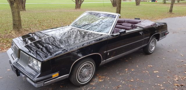1986 Black Oldsmobile Cutlass Convertible