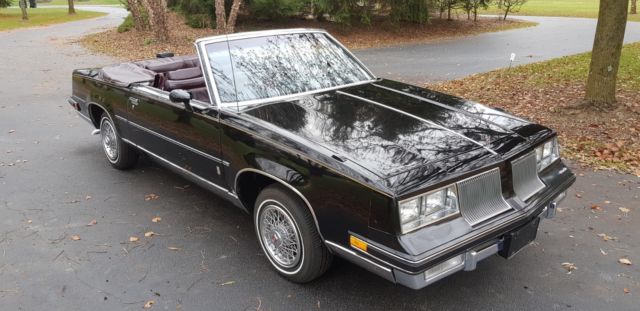1986 Black Oldsmobile Cutlass Convertible