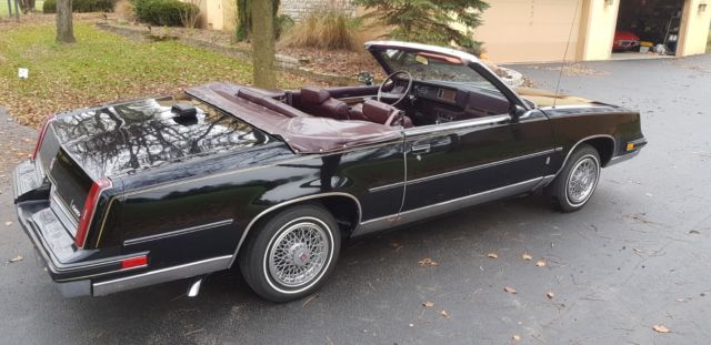 1986 Black Oldsmobile Cutlass Convertible