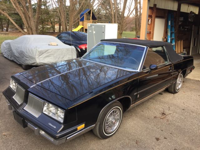 1986 Black Oldsmobile Cutlass Convertible