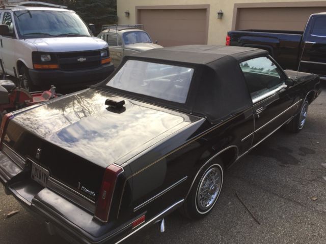 1986 Black Oldsmobile Cutlass Convertible