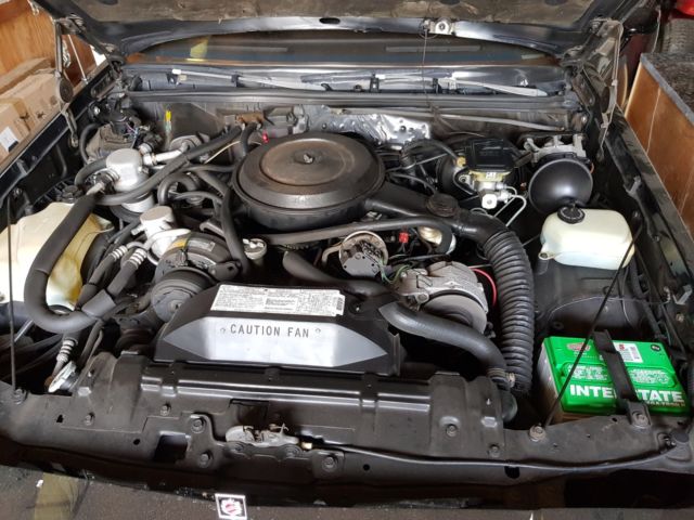 1986 Black Oldsmobile Cutlass Convertible