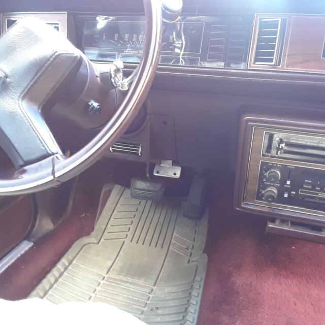 1986 Burgundy Oldsmobile Cutlass Coupe