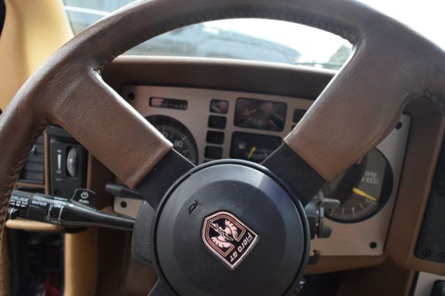 1986 Red Pontiac Fiero Coupe