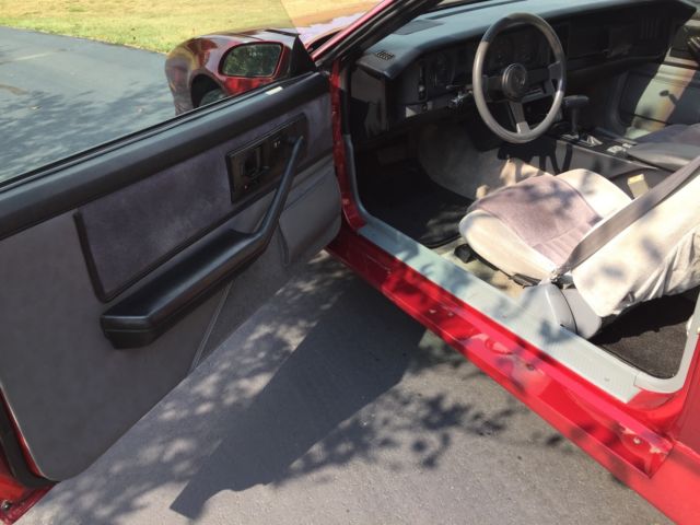 1986 Burgundy Pontiac Trans Am