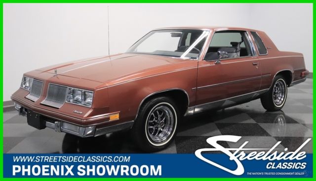 1986 Red Oldsmobile Cutlass