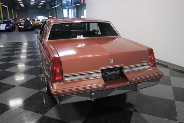 1986 Red Oldsmobile Cutlass