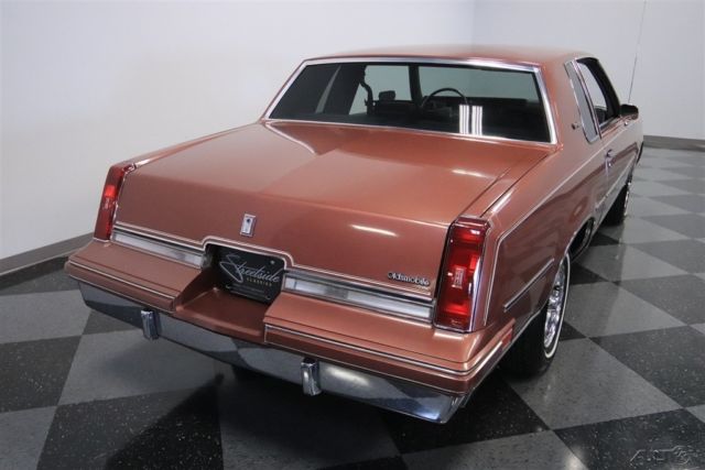 1986 Red Oldsmobile Cutlass