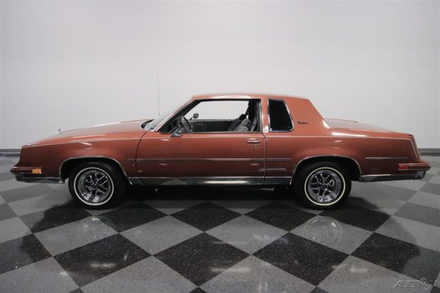 1986 Red Oldsmobile Cutlass