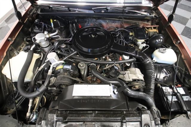 1986 Red Oldsmobile Cutlass