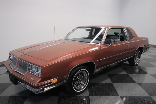 1986 Red Oldsmobile Cutlass