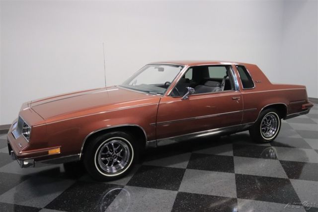 1986 Red Oldsmobile Cutlass