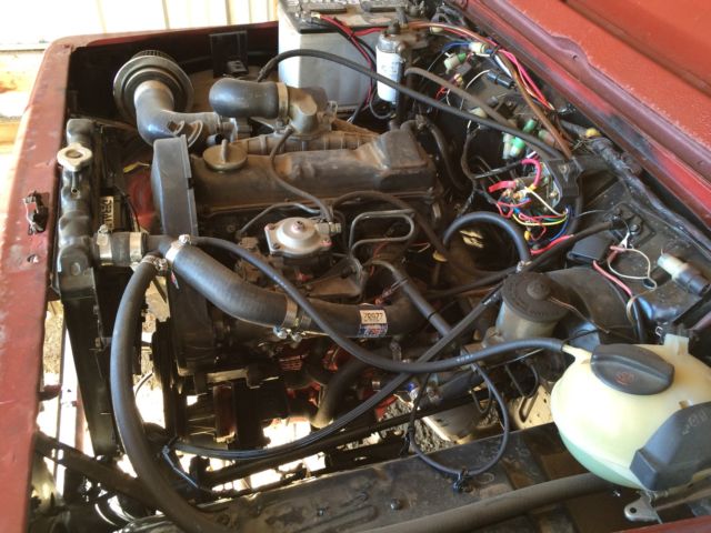 1986 Red Suzuki Samurai SUV