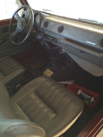 1986 Red Suzuki Samurai SUV