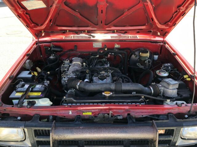 1986 Red Toyota Pickup Standard Cab Pickup