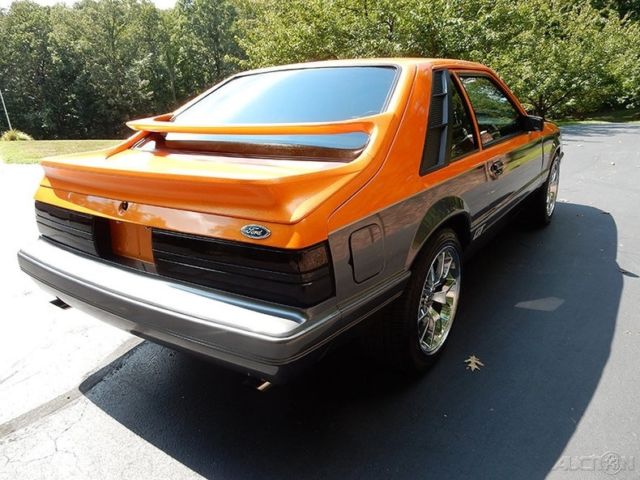 1986 Orange Ford Mustang