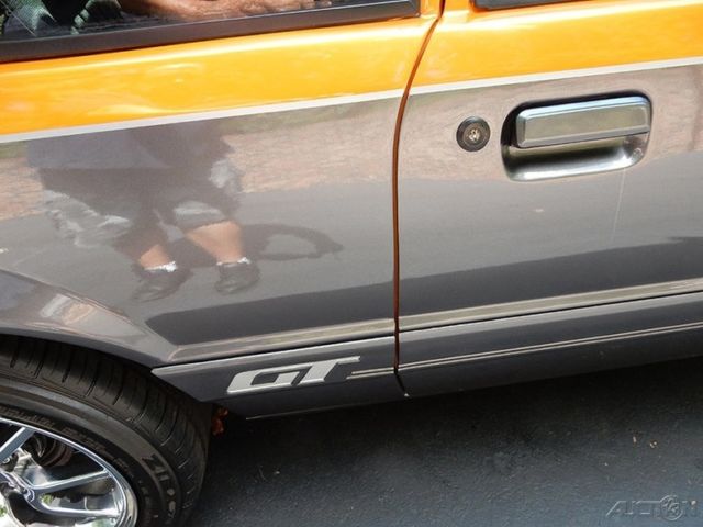 1986 Orange Ford Mustang