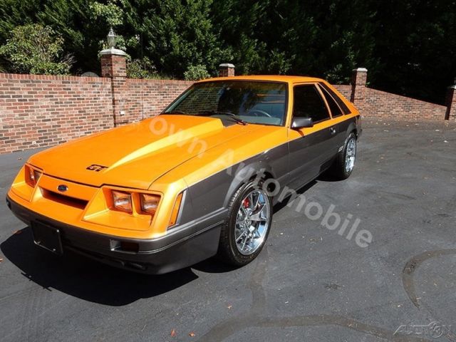 1986 Orange Ford Mustang