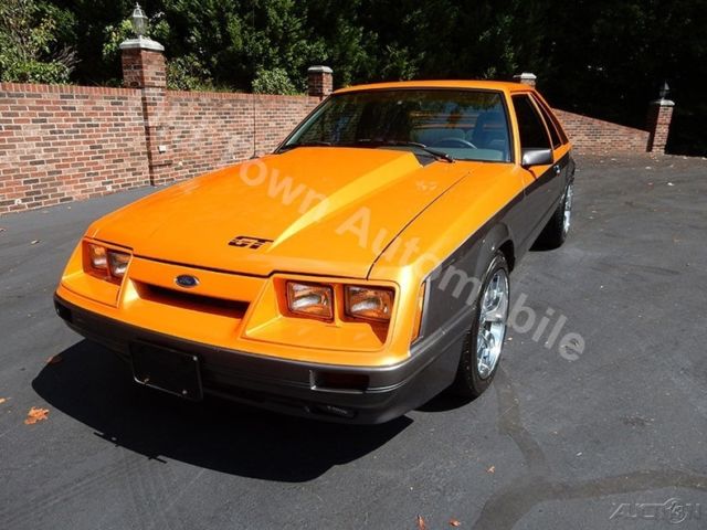 1986 Orange Ford Mustang