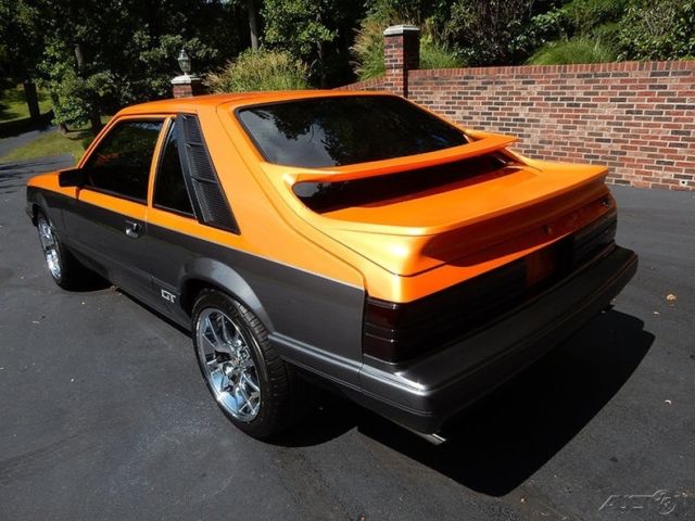 1986 Orange Ford Mustang