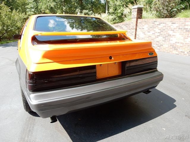 1986 Orange Ford Mustang