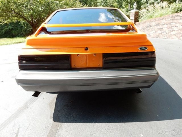 1986 Orange Ford Mustang