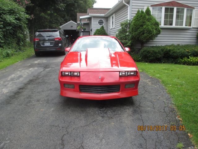 1986 red Chevrolet Camaro Coupe