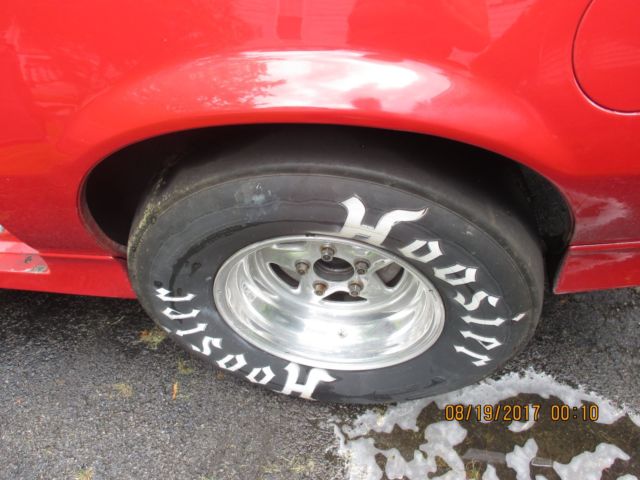 1986 red Chevrolet Camaro Coupe