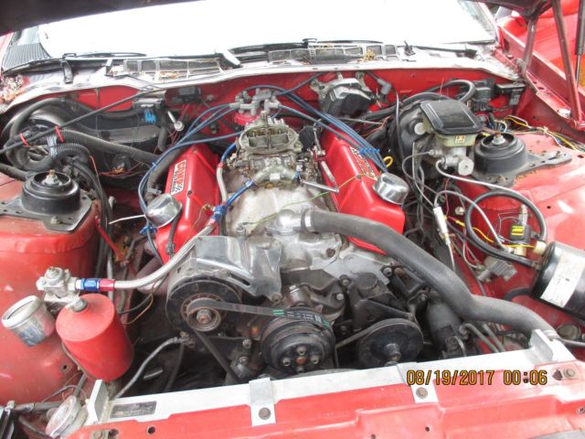 1986 red Chevrolet Camaro Coupe