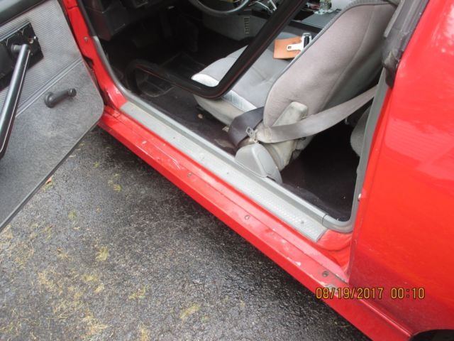1986 red Chevrolet Camaro Coupe