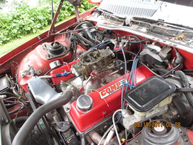 1986 red Chevrolet Camaro Coupe