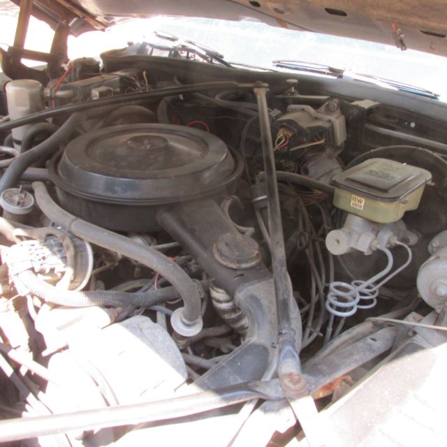 1987 White Cadillac Brougham Coupe