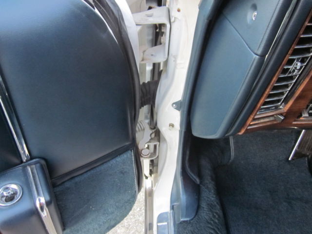 1987 White Cadillac DeVille Sedan