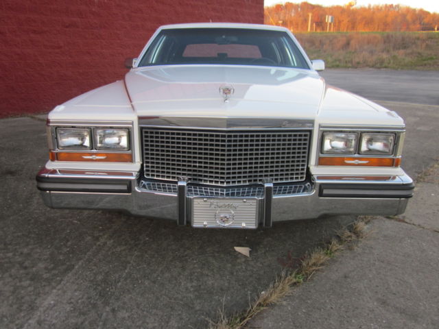 1987 White Cadillac DeVille Sedan