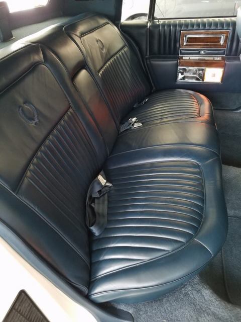 1987 White Cadillac Brougham Sedan