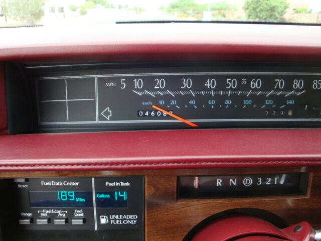 1987 Burgundy Cadillac DeVille Coupe