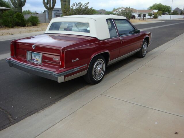 1987 Burgundy Cadillac DeVille Coupe