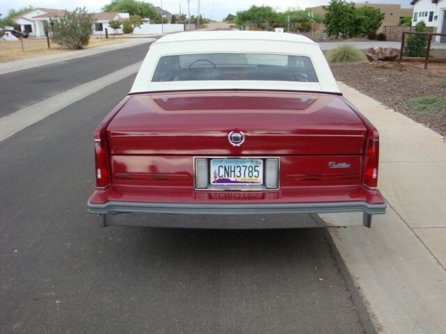 1987 Burgundy Cadillac DeVille Coupe