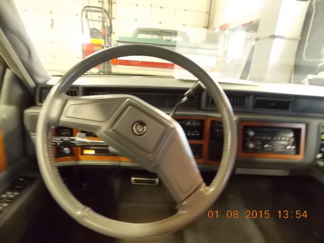 1987 Gray Cadillac Fleetwood Sedan