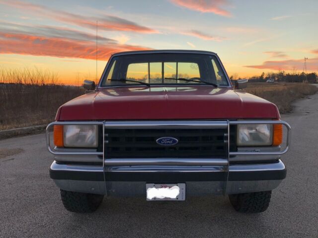 1987 Red/Silver Ford F-250 Extended Cab Pickup