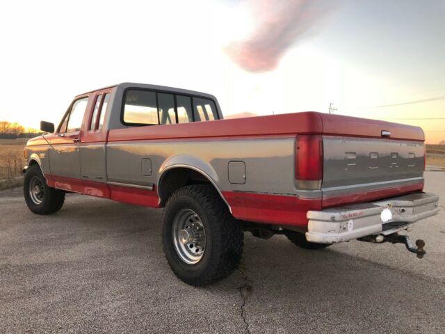 1987 Red/Silver Ford F-250 Extended Cab Pickup