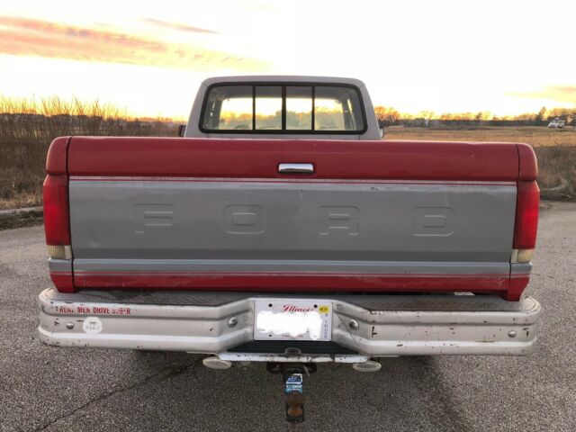 1987 Red/Silver Ford F-250 Extended Cab Pickup