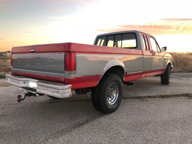 1987 Red/Silver Ford F-250 Extended Cab Pickup